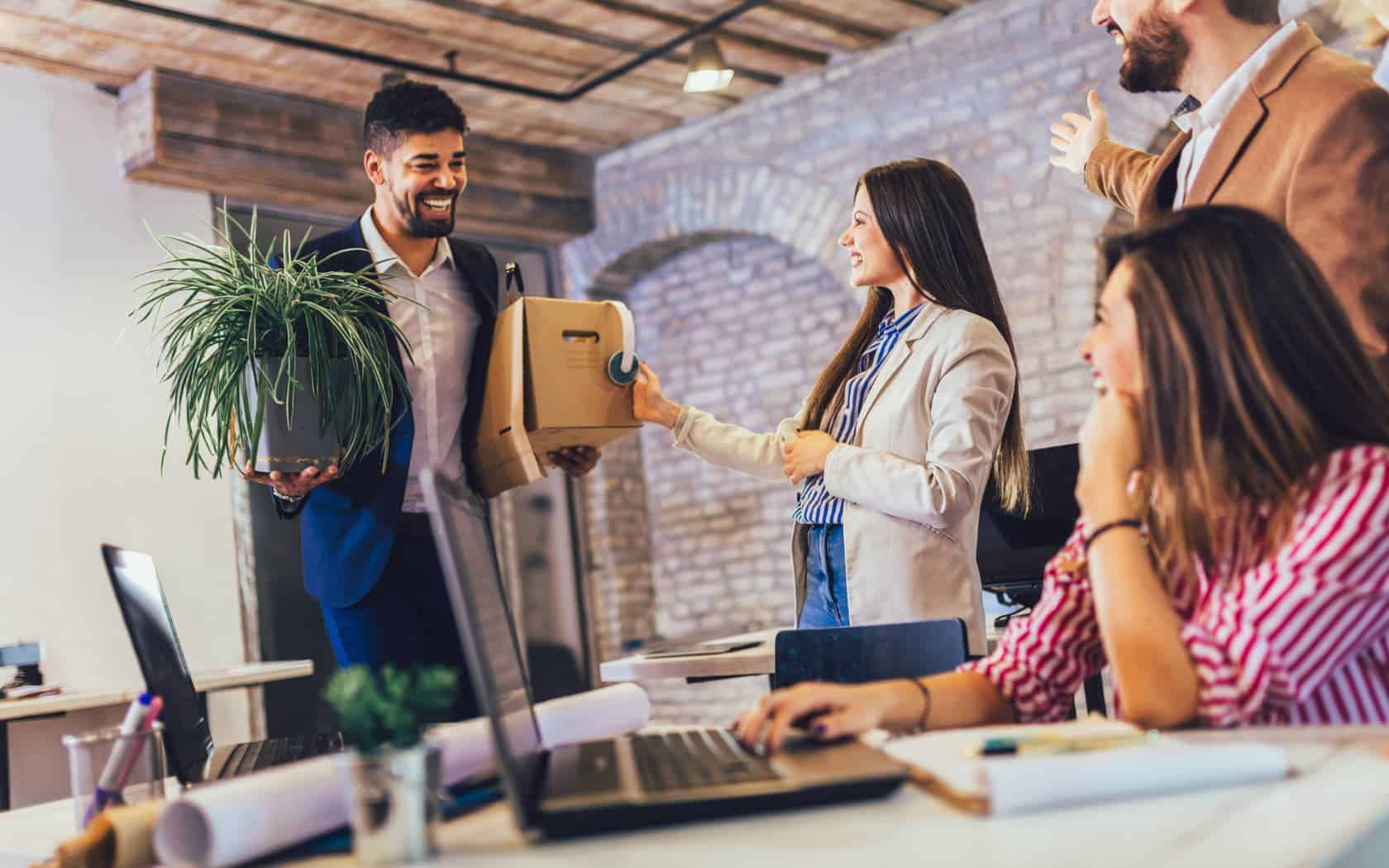 office workers talking around a table