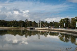 View of the canal and pedestrian bridge at Hawthorne Canal Reserve in Leichhardt, Sydney.