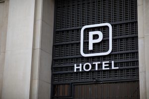 Hotel parking entrance sign showing how unused hotel parking spaces can be turned into a revenue opportunity.