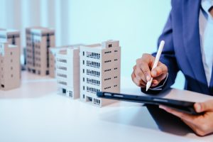 Property team planning parking management for a commercial or strata building using digital tools