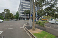 Two secured car parking spaces near Olympic Park station.