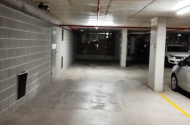 Secured car parking spaces near Olympic Park station.