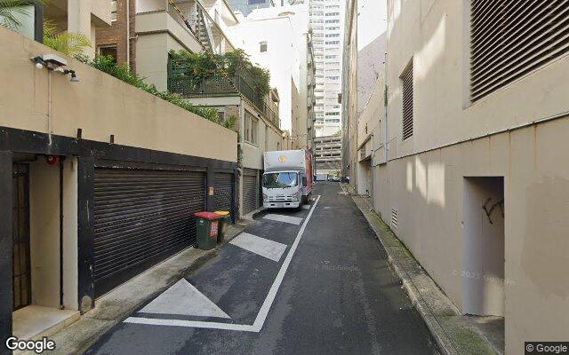 Parking lot next to lifts and ramp, easy access with fold down parking bollard