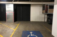 Parking space with secure remote-controlled access