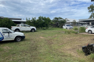 Great parking space in huge open backyard with security cameras for safety, privacy and secure park.