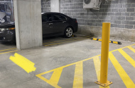Underground secure car parking space in Olympic Park / Lidcombe
