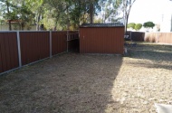 Backyard storage behind gate