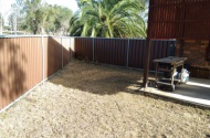 Backyard storage behind gate