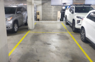 Double parking space, secure under-building