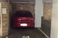 Secure undercover parking space in Elizabeth Bay. Suitable for small car or motor bikes.