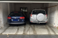 Easy, secure, fully enclosed garage near Smith & Gertrude St. Fits 2 cars. You're booking LEFT SIDE