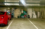 Secured indoor reserved parking space on St Kilda Road