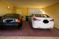 Secure parking space in a private carport