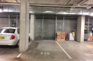 Parking spot in gated garage PLUS storage cage