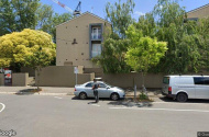 Outdoor private parking lot just off Gertrude Street, great location and easy access