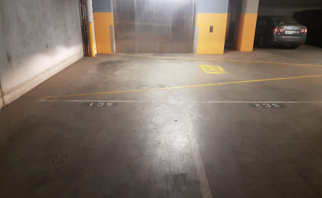 Great private parking space near CBD in front of elevator entrance