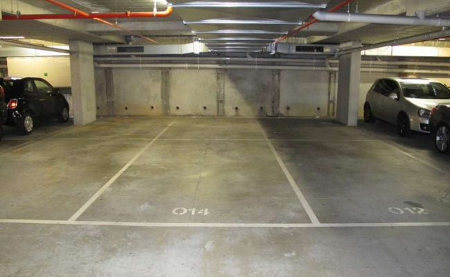 Secure, underground car space available in busy Acland Street apartment complex