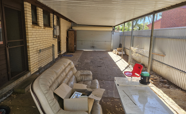 Lockable, unused carport by a car guy