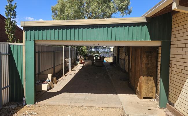 Lockable, unused carport by a car guy