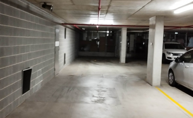 Secured car parking spaces near Olympic Park station.