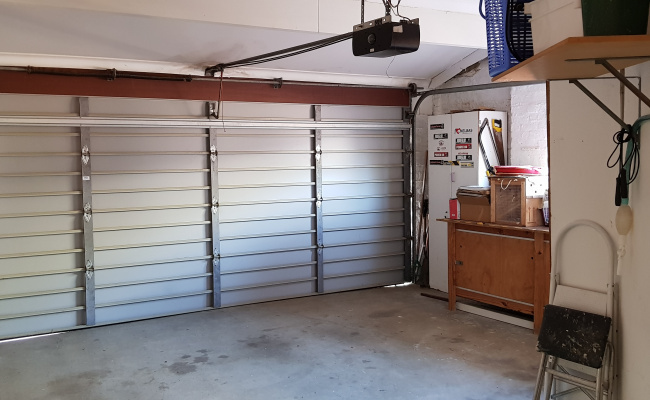 Double Lock Up Garage for parking or storage (Shared garage with the host)