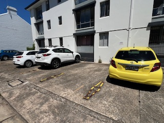 Open-air parking bay near Moore Park