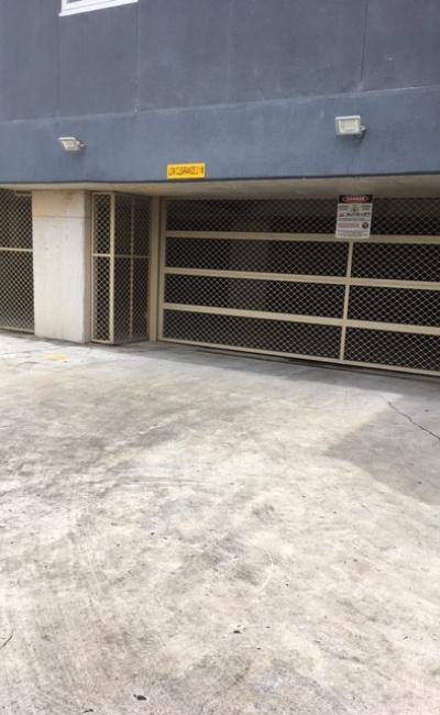 Secure undercover parking near station