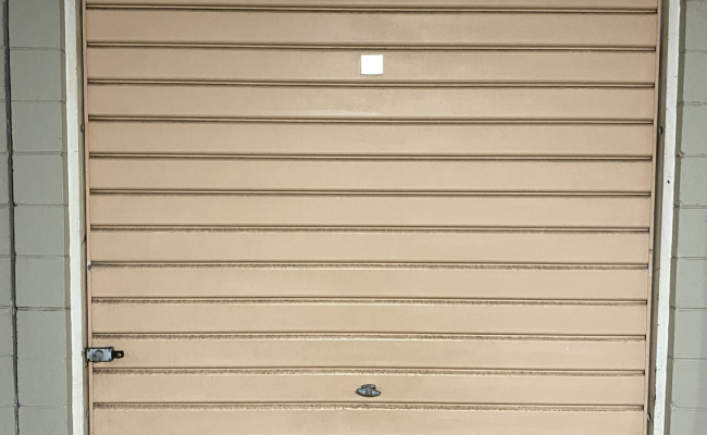 Private lock-up garage next to station