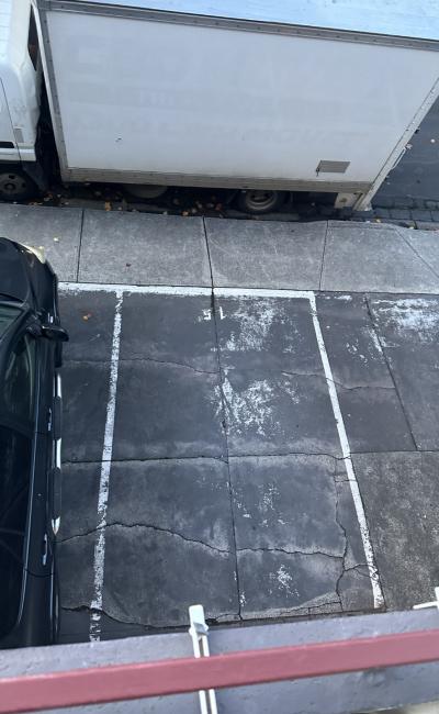 Private outdoor parking space in a residential apartment complex in South Yarra.