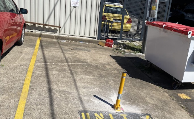 Bollard reserved parking space in Phillip Business District