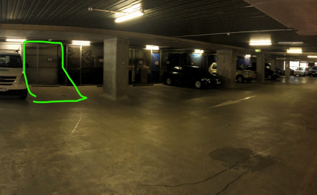 Secure undercover car space in Melbourne with storage cage