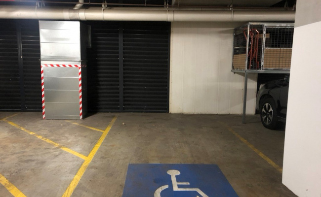 Parking space with secure remote-controlled access