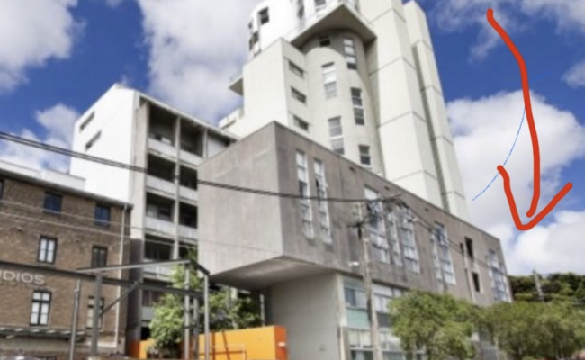 Car stacker space in cool convenient silo building