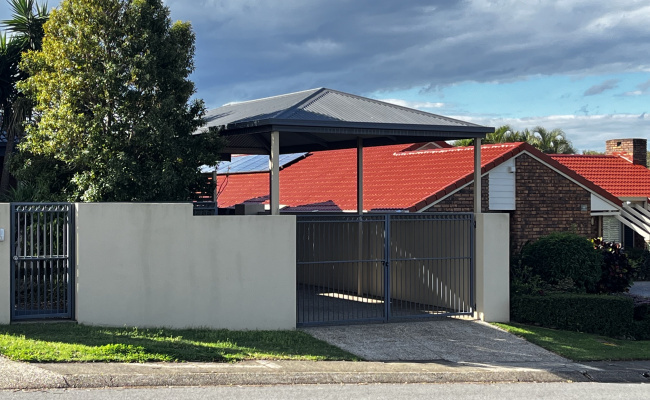 Secure Covered Parking Space Behind Locked Gate Easy Access