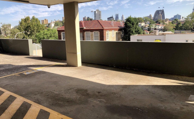 Undercover, off-street car space. Close to train stations and North Sydney wharf