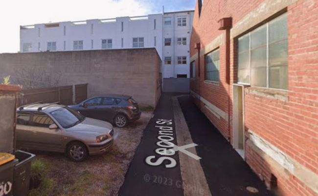 CBD parking with easy access to tramlines with security camera.