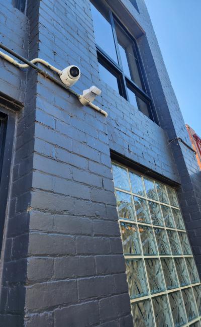 Motion flood lighting and cameras - bay closest to the back door