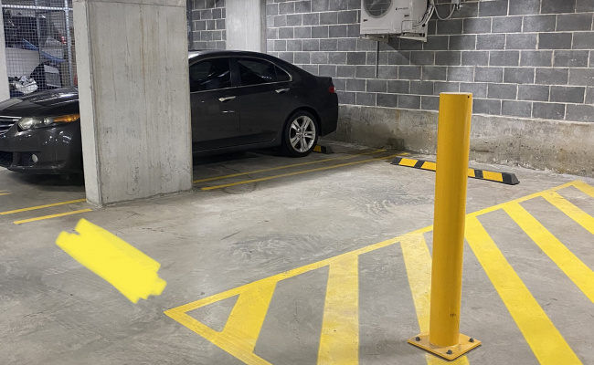 Underground secure car parking space in Olympic Park / Lidcombe