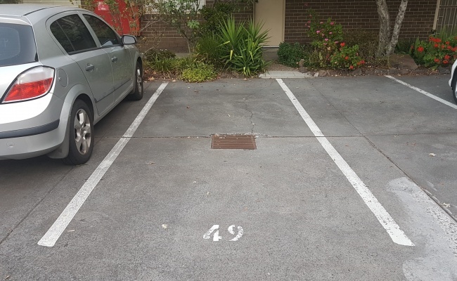 A Secure outdoor parking space close to the city