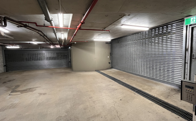 Secure basement lock up parking space, Newstead near gasworks precinct. Dual security rollerdoor