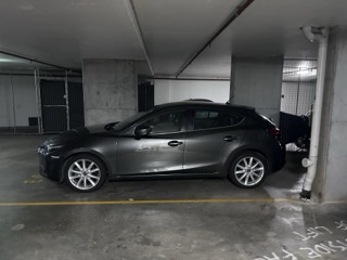 Parking in the secured garage of the building