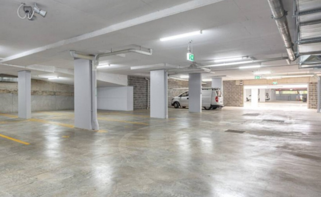 Parking space in front of grove shopping centre