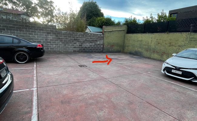 Open private car space located near the beach
