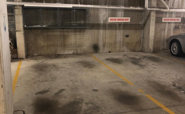 Secure underground parking space with storage