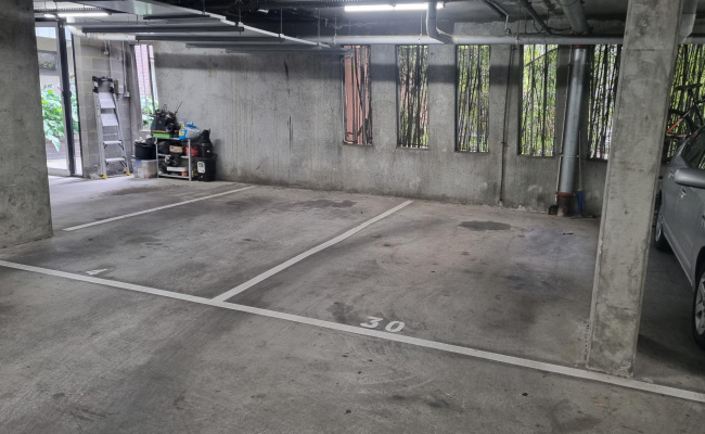 Indoor, secure ground level car space near Brunswick St & Alexandra Parade