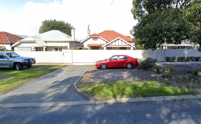 Outdoor parking space close to bus stop 27 and train station