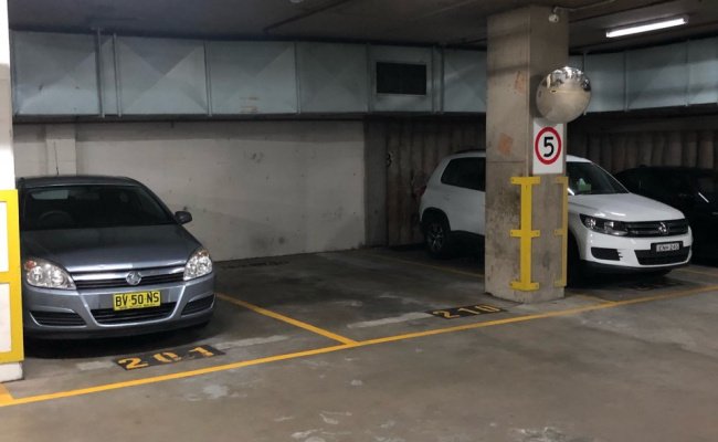 Indoor car space in secure basement of warehouse conversion