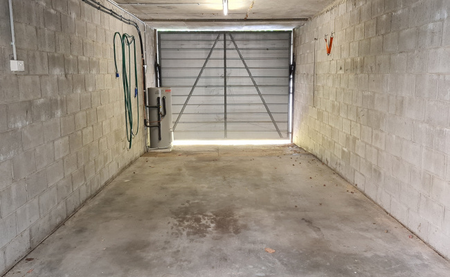 Lock-up Garage only minutes away from Train Station.