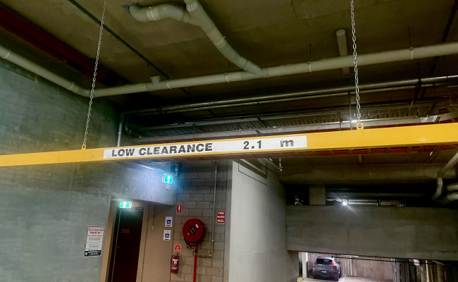 Secured indoor reserved parking space on St Kilda Road