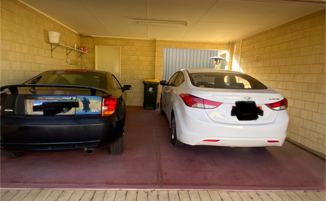 Secure parking space in a private carport